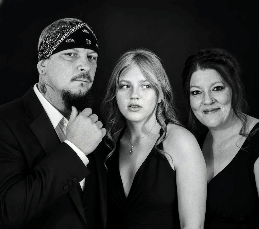 Studio black and white family portrait graphic design example